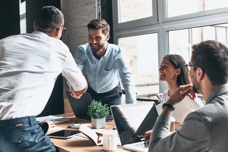 Clients shaking hands after a meeting