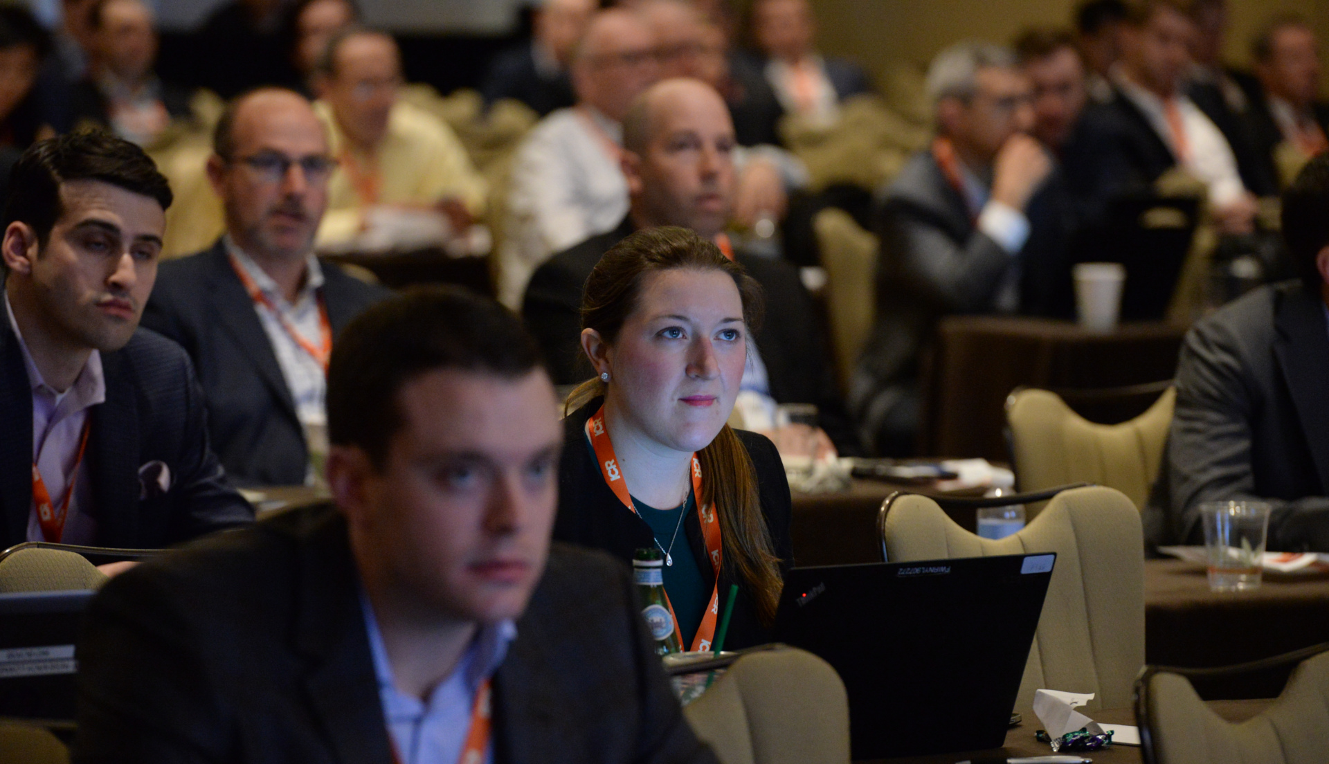 People in the audience at a conference