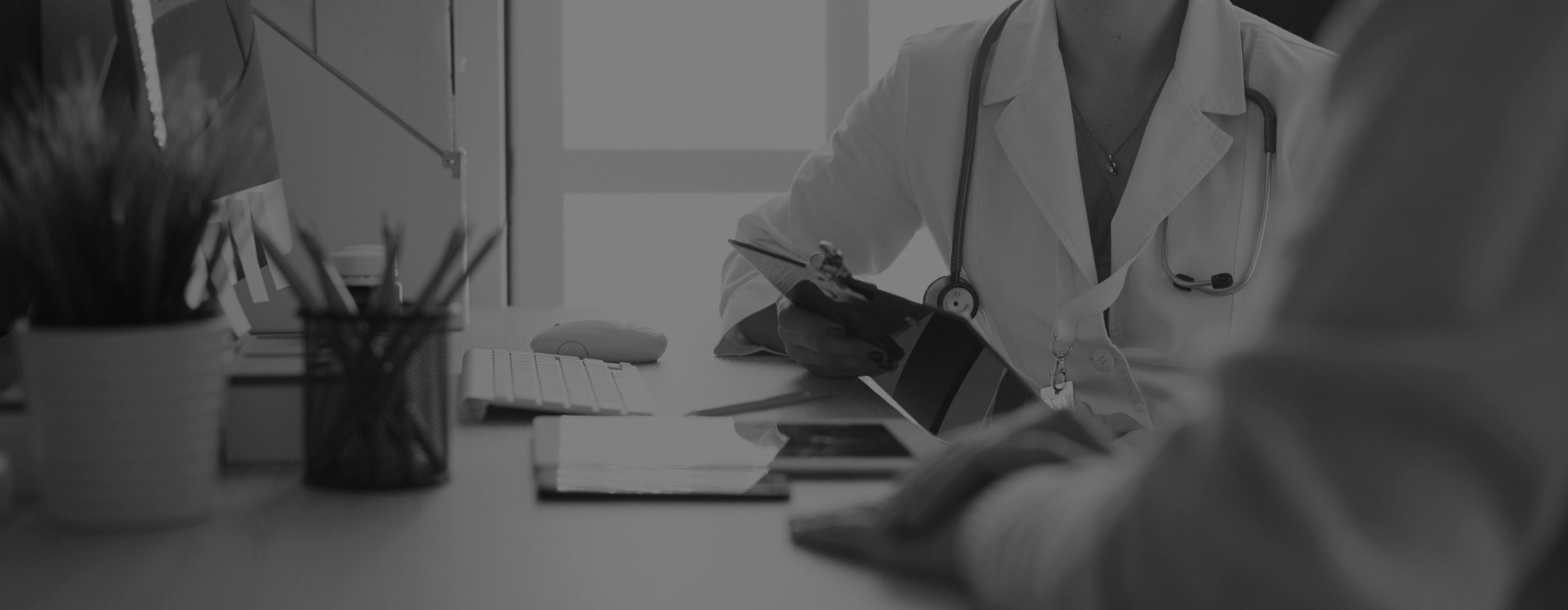 doctors sitting at an office table