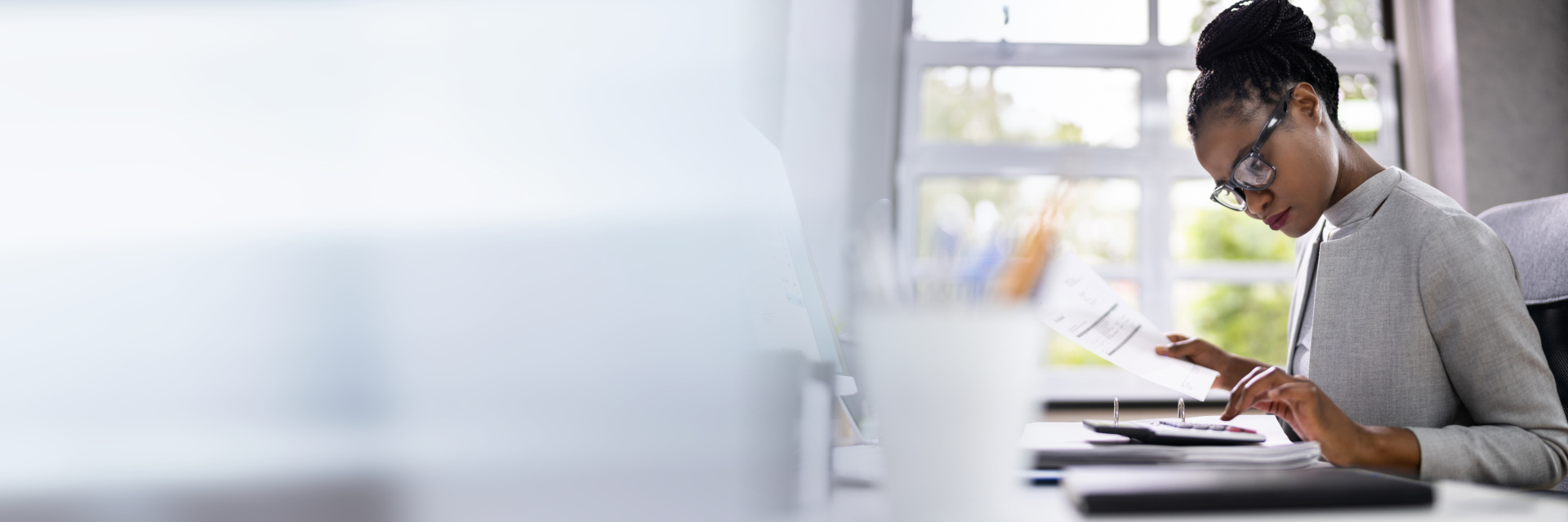 woman working at her desk in an office