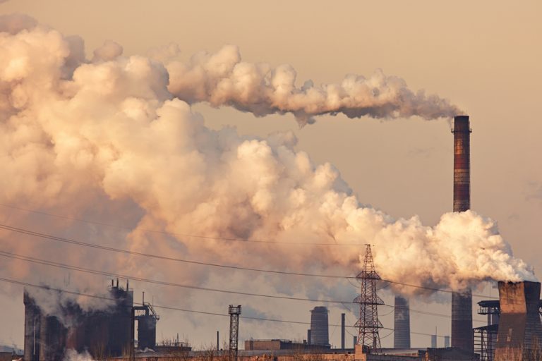 chemical factory with smoke stacks