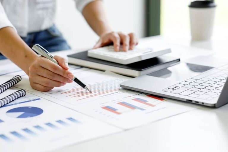 close up of analyst reviewing data in front of computer