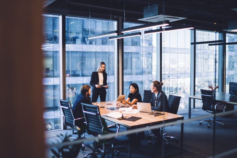 Business people around conference table