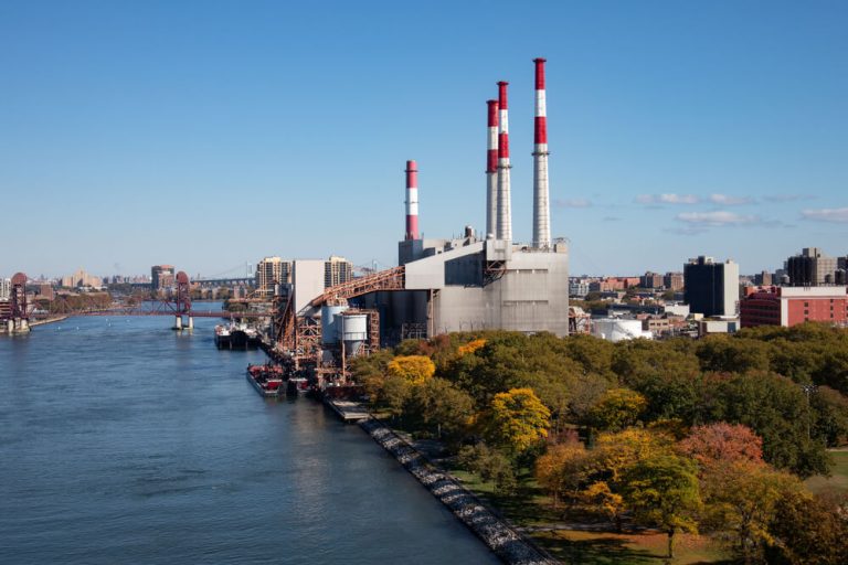 Factories on riverfront next to landscape of trees ESG|Taking Stock of Communications Graphic 1|Taking Stock of Communications Graphic 2|Taking Stock of Communications Graphic 1|Taking Stock of Communications Graphic 2