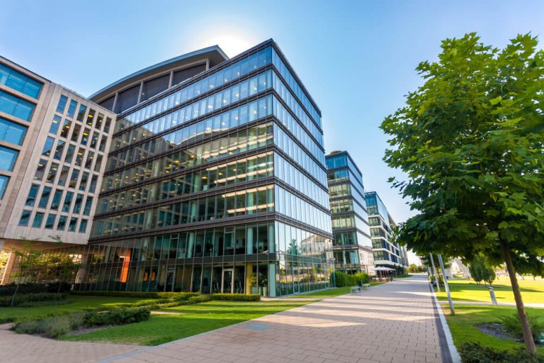 Suburban office building glass windows landscape image