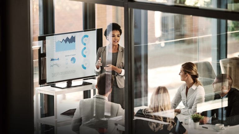 Shot of a businesswoman delivering a presentation to her colleagues in the boardroom