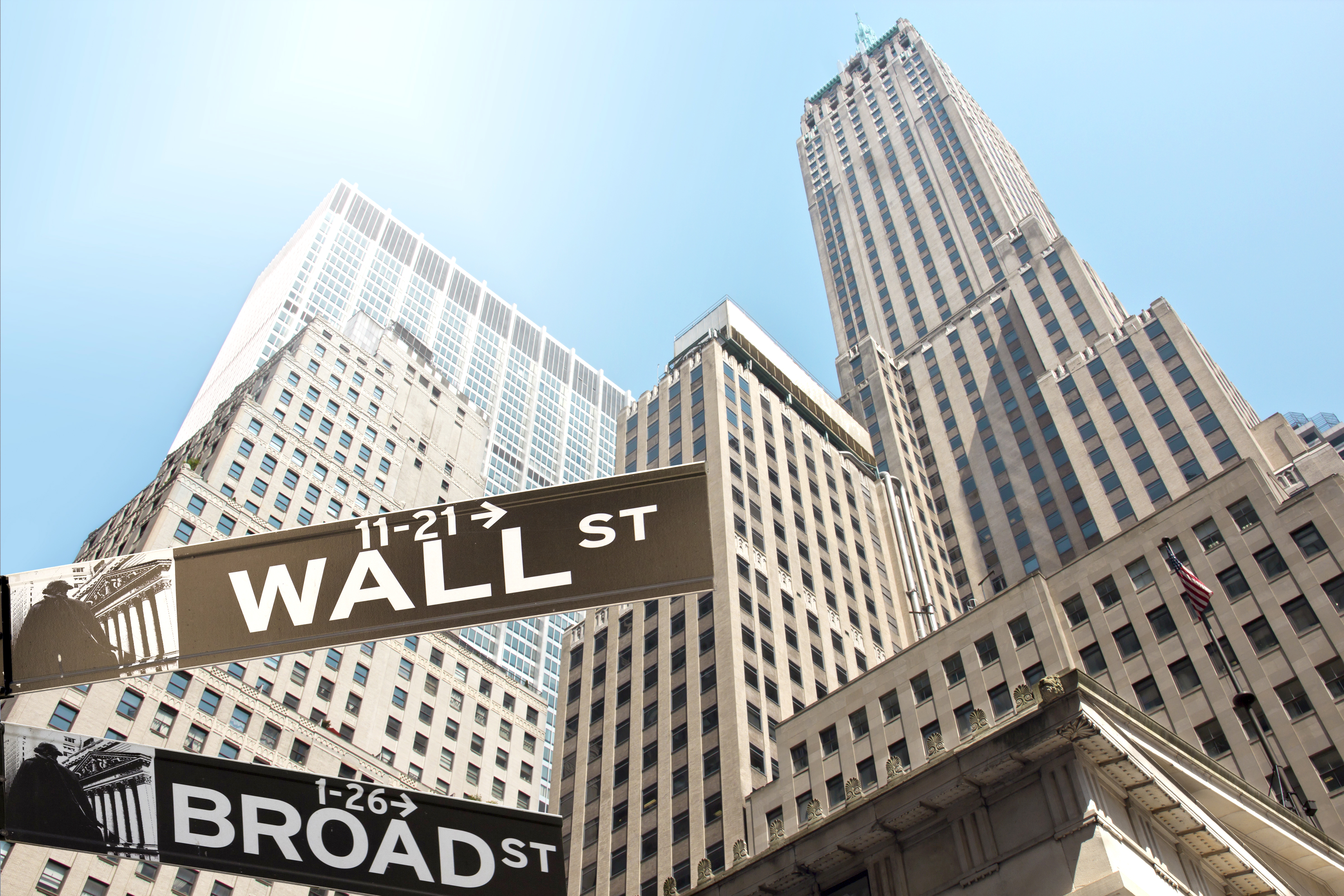 towering buildings on wall street in new york